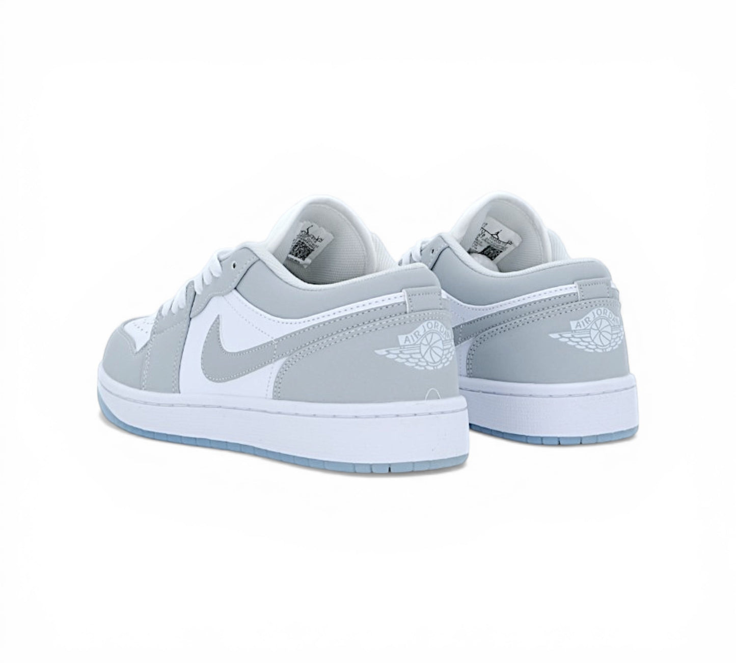 Низкие кроссовки Air Jordan 1 Low, серый и белый, вид сбоку