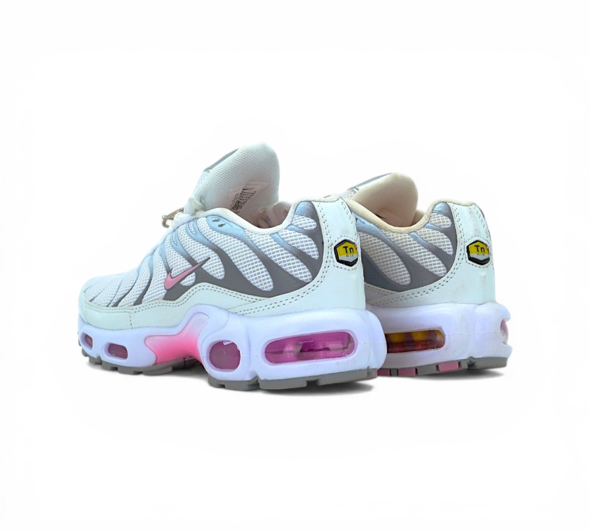 Кроссовки Nike Air Max Plus, белые с розовым, вид сбоку